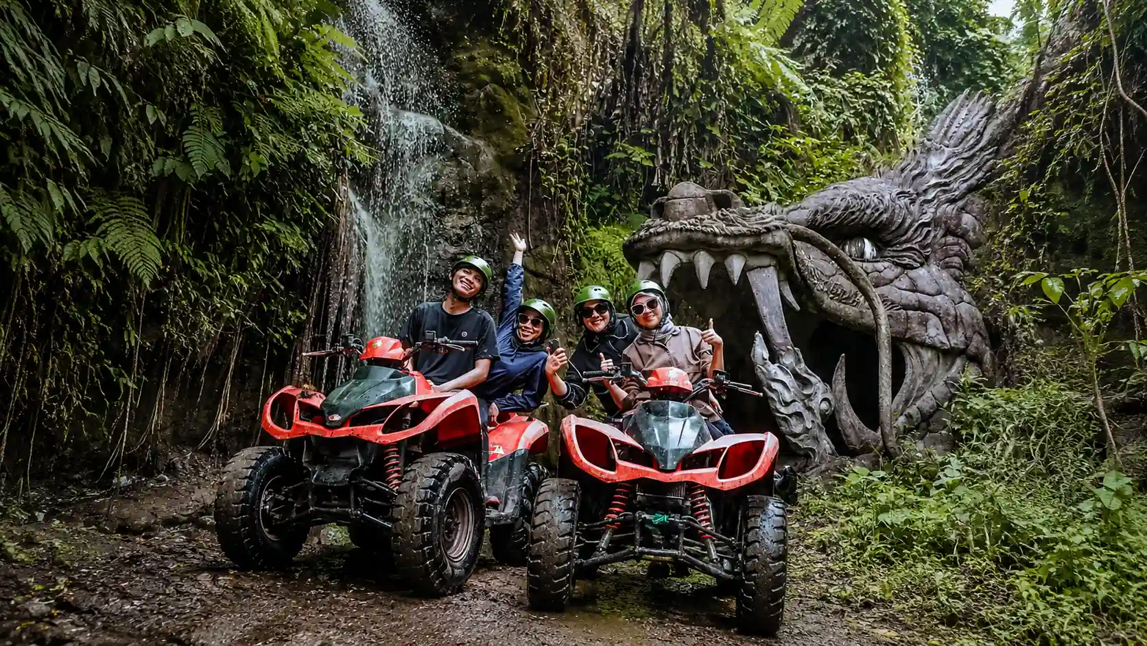 Green Bali Adventure ATV riders crossing an off-road track near Ubud Bali