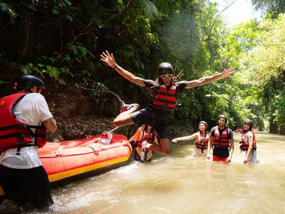 Surya Bintang Adventures guests taking a break during their Ayung River rafting trip